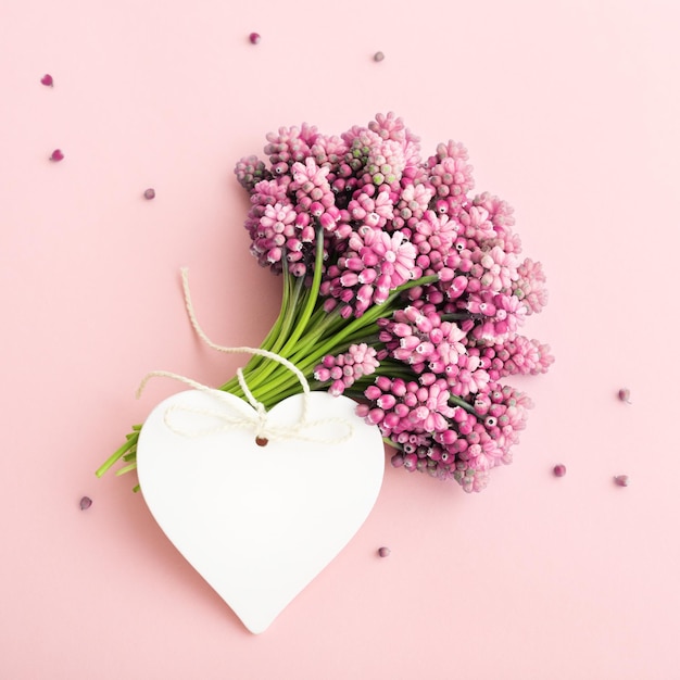 Pink flowers and white heart shape greeting card mock up for Mother's Day