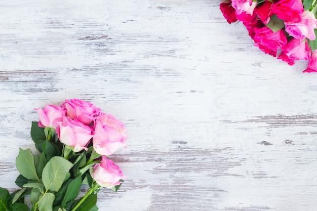 Pink fresh rose flowers bouquet on white