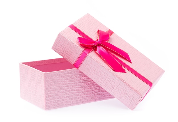 Pink gift box with ribbon isolated on white background.