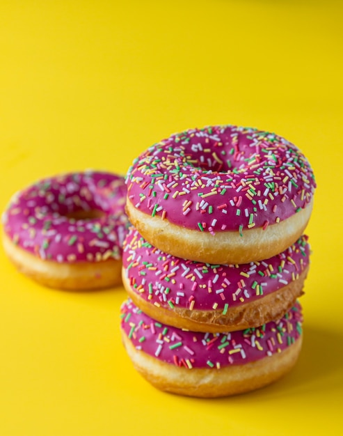 Pink glaze dessert with colorful sprinkles