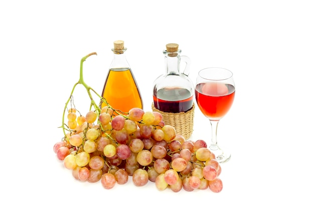 Pink grapes and wine closeup