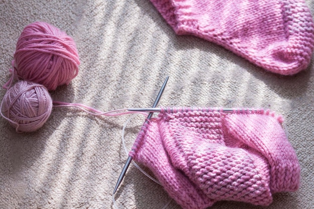 Pink knitted socks Hobby relax concept