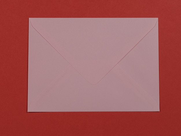 Pink letter on red background