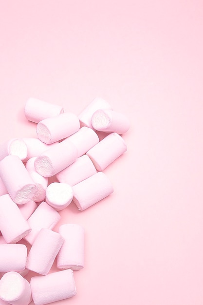 Pink marshmallow candies background