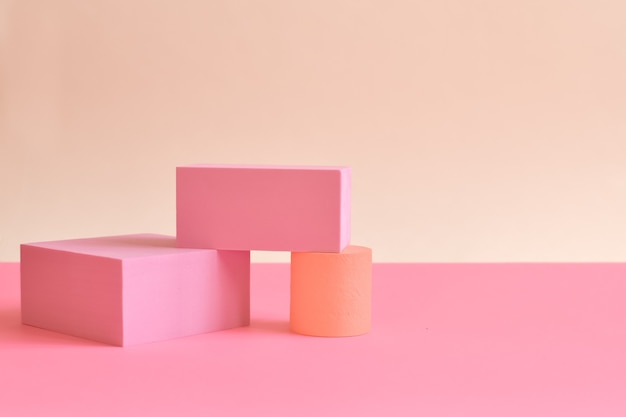 Pink minimalist abstract background. three-dimensional geometric shapes, pastel colors. podiums