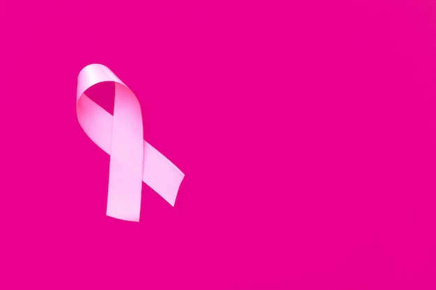 Pink October Pink ribbon on pink background