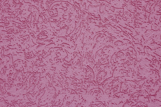 Pink paper texture. Abstract pattern on the wall.