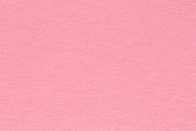 Pink paper, Texture for background, close up. High resolution photo