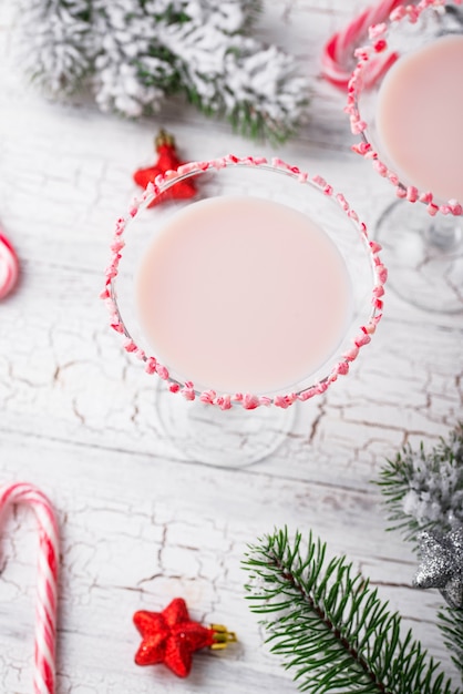 Pink peppermint  with candy cane rim. Christmas cocktail