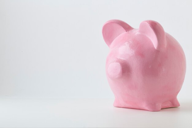 Pink Piggy Bank On White Background