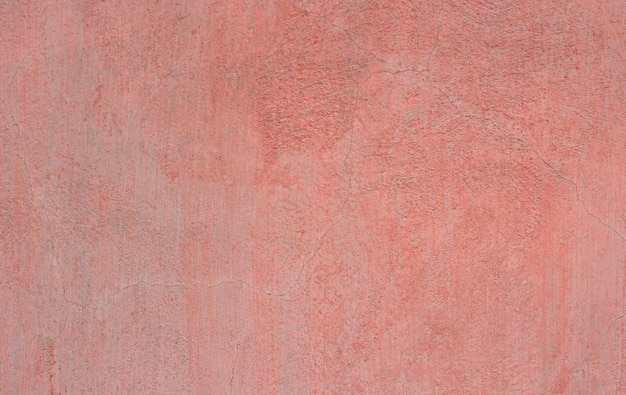 Pink plastered surface with streaks