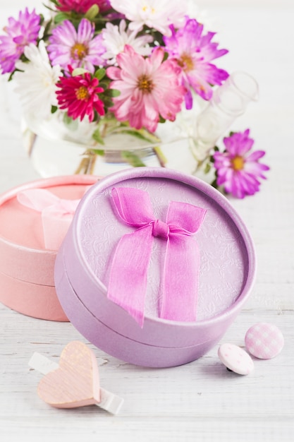 Pink purple garden flowers and gift box 