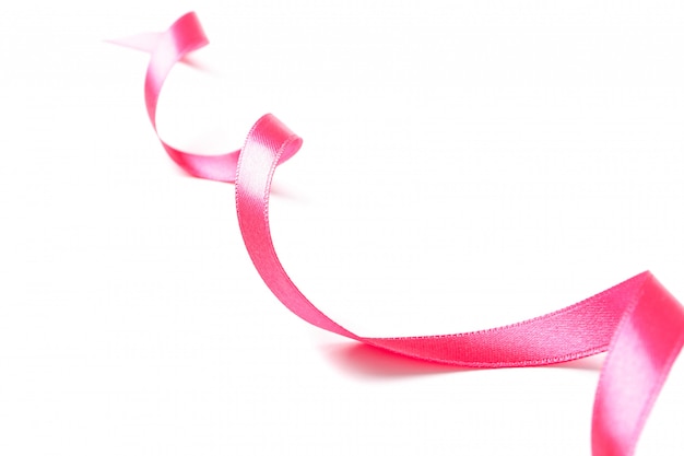 Pink ribbon isolated on white