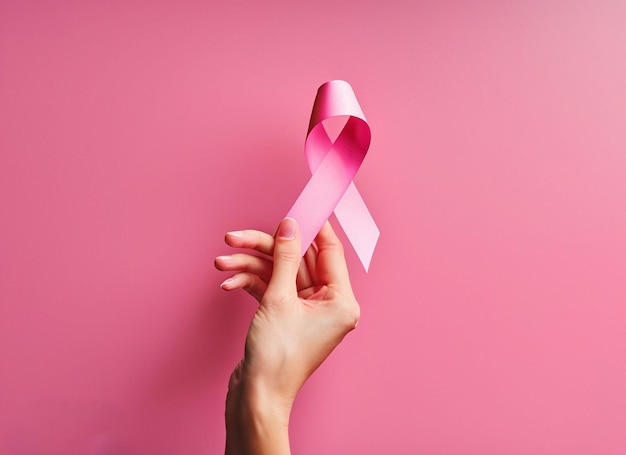 Pink ribbon on pink background