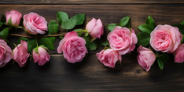 Pink roses on a wooden table