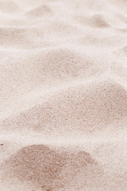 Pink Sand texture natural background Close up sandy beach sand on shore sea waves textured