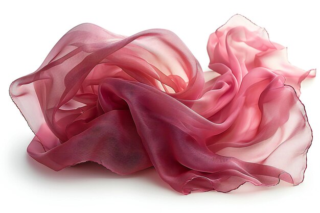 a pink silk scarf is laying on a white surface