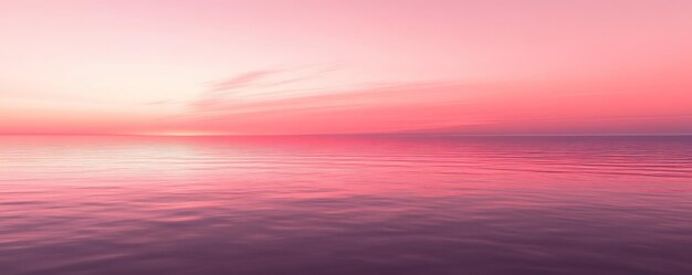 Photo a pink sky with a pink and purple horizon