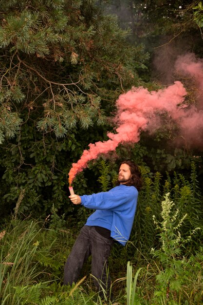 Pink smoke background with young adult