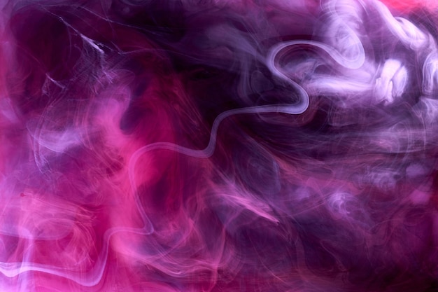 Pink smoke on black ink background, colorful fog, abstract swirling touch ocean sea, acrylic paint pigment underwater