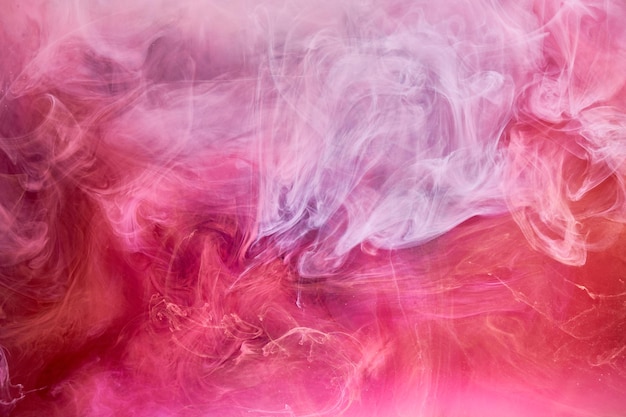 Pink smoke ink background, colorful fog, abstract swirling touch ocean sea, acrylic paint pigment underwater