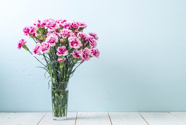 pink spring flower on wood