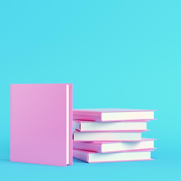 Pink stack of books on bright blue background in pastel colors