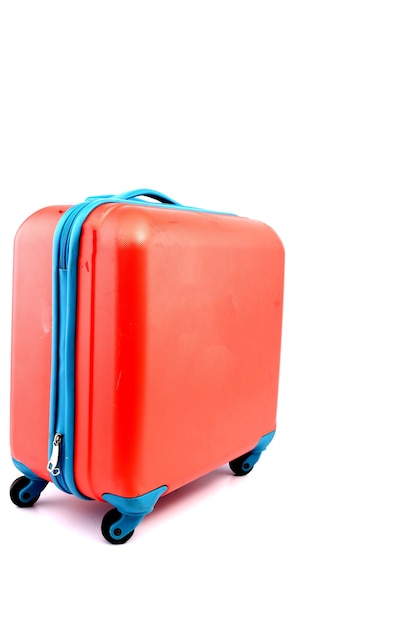 Pink suitcase isolated on white background.