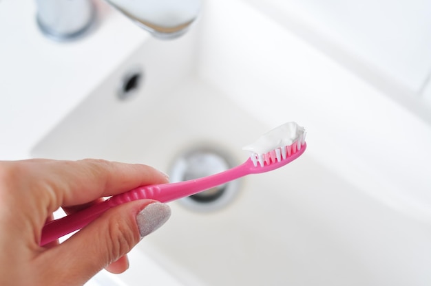 Pink teeth brush for everyday cleaning morning routine