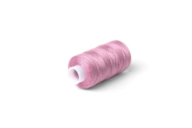 Pink threads on white background.