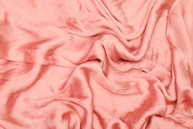 Pink toned abstract fabric texture for background