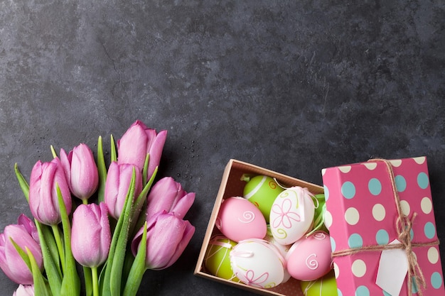 Pink tulip flowers and easter eggs