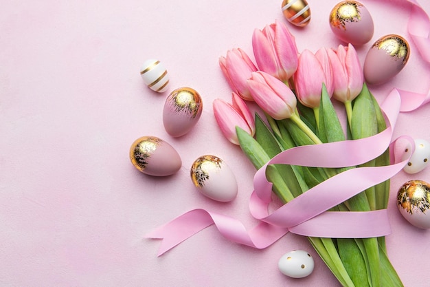 Pink tulips and Easter eggs background