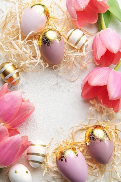 Pink tulips and Easter eggs background