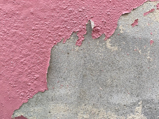 A pink wall with a pink and gray background.