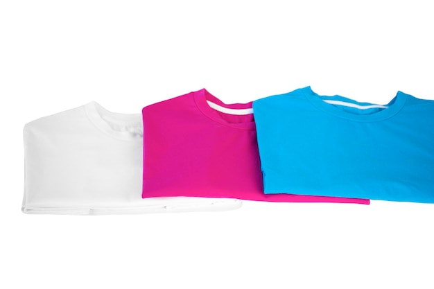 pink white and black folded t-shirt on a white background. photography for clothing advertising. cas