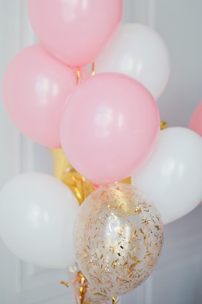 Pink white and golden balloons with confetti Birthday party for little girl