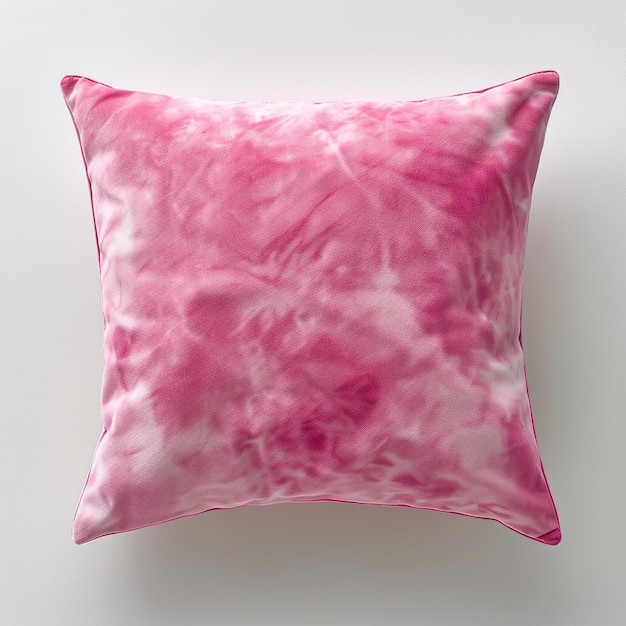 a pink and white pillow with a pink and white pattern