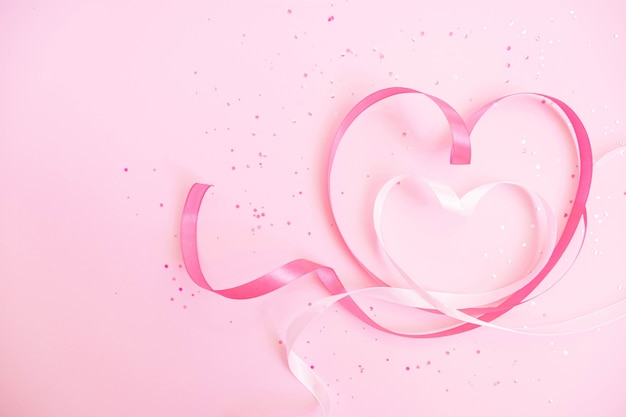 Pink and white ribbon heart shaped