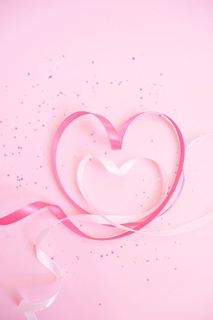 Pink and white ribbon heart shaped