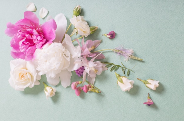 Pink and white roses on paper background