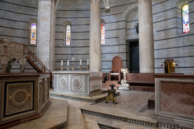 Pisa, Italy - June 29, 2018: Panoramic view of interior of Pisa Baptistery of St. John (Battistero di San Giovanni) is a Roman Catholic ecclesiastical building in Pisa