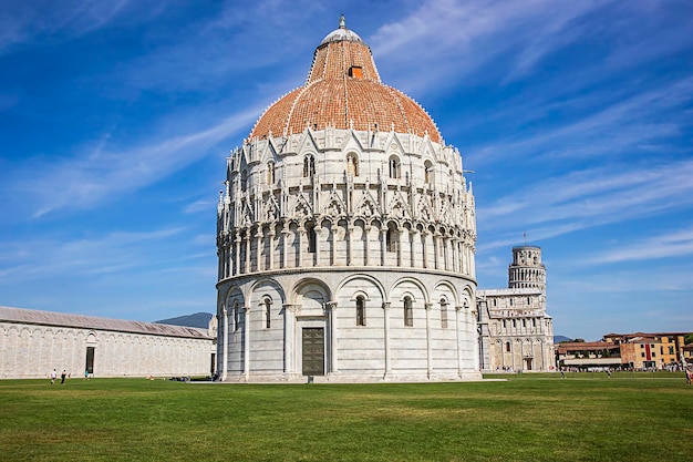 Pisa Leaning tower and Baptistery in Italy in summertime