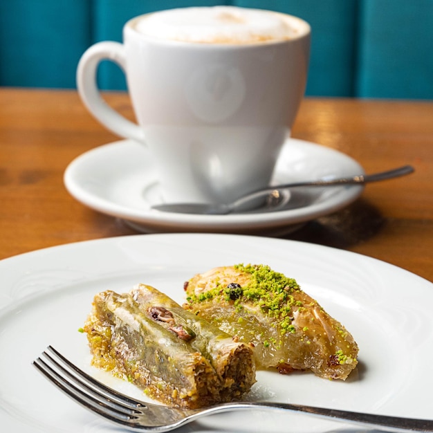 Pistachio baklava dessert and a cup of coffee