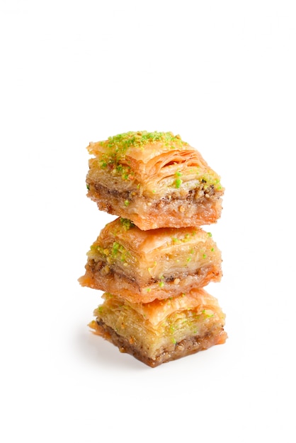 Pistachio baklava on a white background. Dessert.