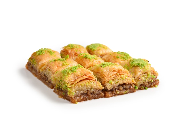 Pistachio baklava on a white background. Dessert.