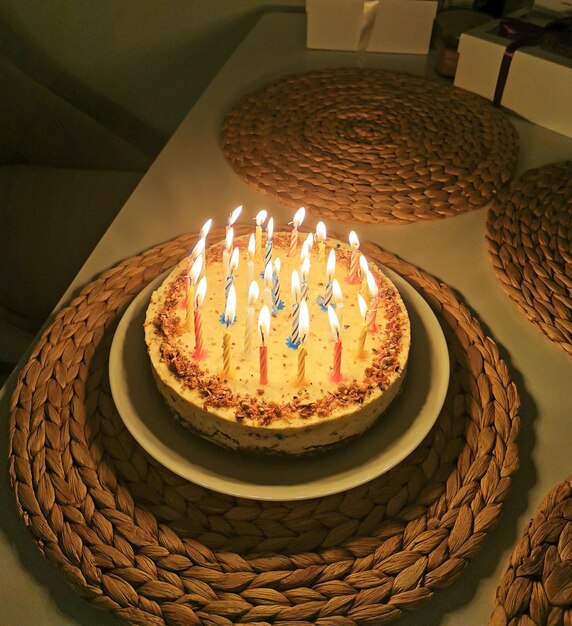 Pistachio cheesecake with festive birthday candles