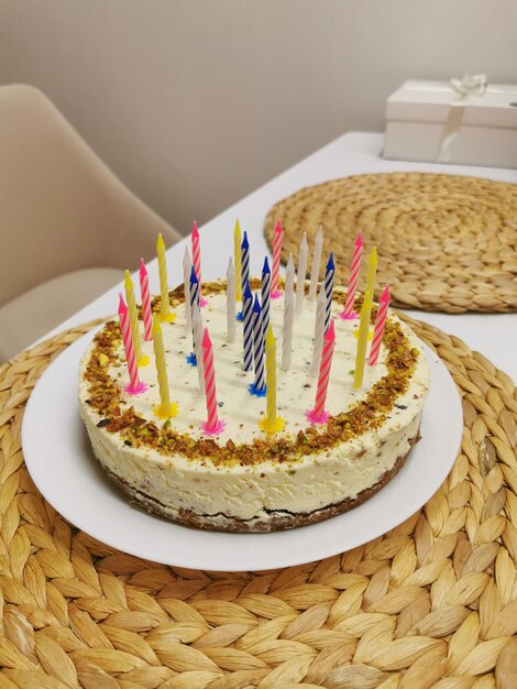 Pistachio cheesecake with festive birthday candles