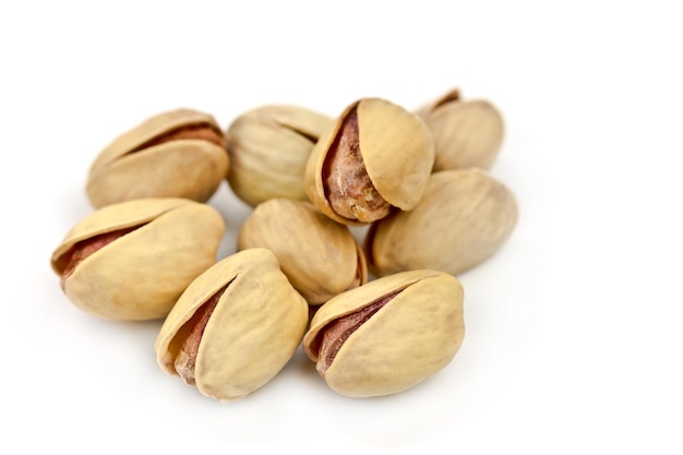 Pistachio nuts isolated on white background