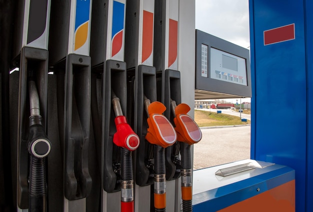 Pistols for pouring gasoline and diesel fuel at a gas station Fuel for cars transport